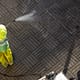 worker cleaning a street sidewalk